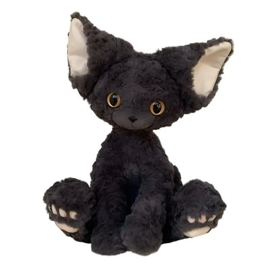 Plush toy cat with large ears on a beige background