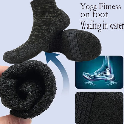 Black textured socks with sole, held by a hand, on a light blue background with text about yoga fitness and wading in water.